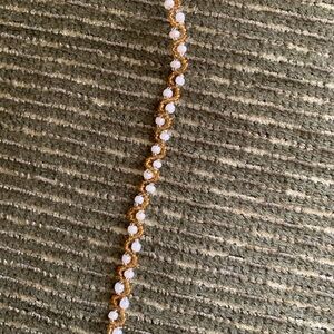 Elegant Gold and White Bracelet